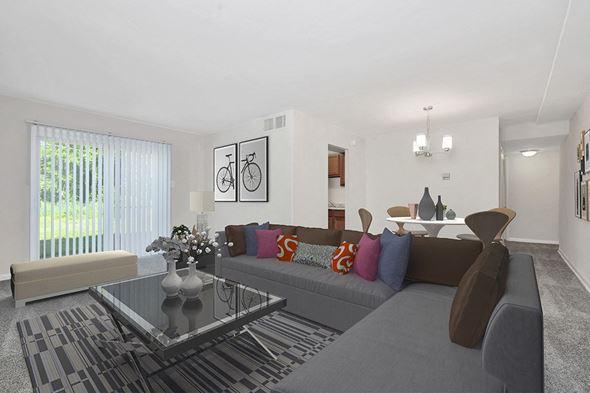 Hyattsville apartment for rent - a living room with a couch and a glass coffee table