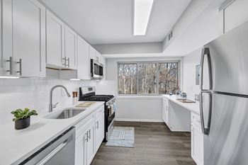 Newly renovated homes available with stainless steel appliances, subway tile backsplash, granite countertops, white shaker cabinets & plank flooring