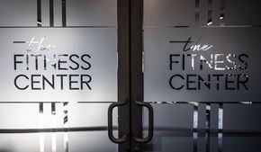 Richmond apartment for rent - a sign for the fitness center is seen through a glass door