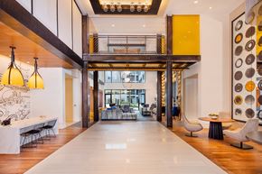 Fairfax apartment for rent - A large open space with a white table and chairs.