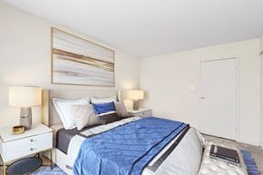 Alexandria apartment for rent - a bedroom with a bed and two night stands and a closet