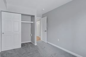 Columbia apartment for rent - a bedroom with a closet and a door to a hallway