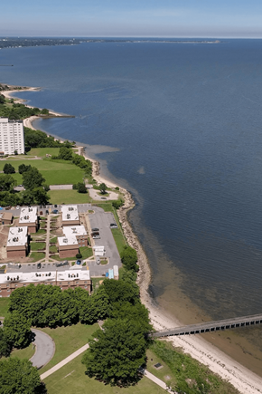 Norfolk townhouse for rent - an aerial view of the shoreline of a beach and a body of water