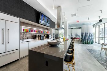 Community demonstration kitchen with coffee bar