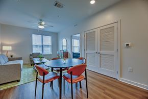 Memphis townhouse for rent - A dining room with a round table and four chairs.