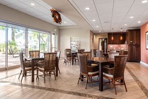 Los Angeles apartment for rent - A dining room with a table surrounded by chairs.