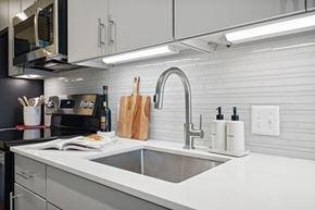 Alexandria apartment for rent - a kitchen with a sink and a microwave at Sinclaire on Seminary, Alexandria, VA 22311