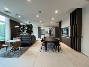 Cranford apartment for rent - Resident amenity space with conference table and chairs
