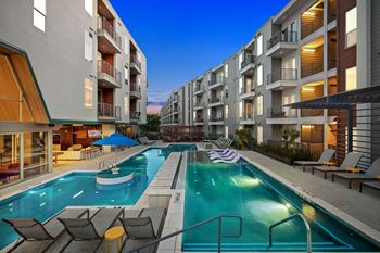 Multi-tiered resort waterfall-style swimming pool