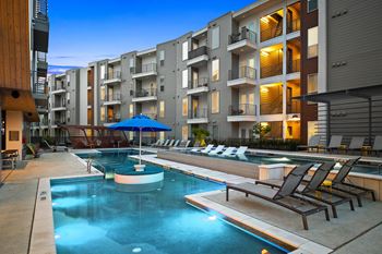 Multi-tiered resort waterfall-style swimming pool