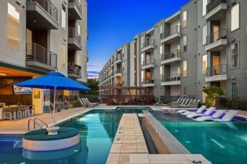 Multi-tiered resort waterfall-style swimming pool