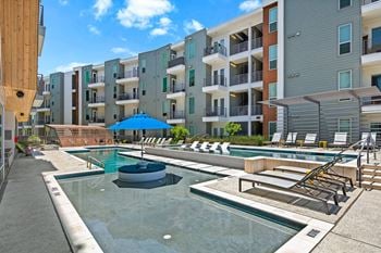 Multi-tiered resort waterfall-style swimming pool