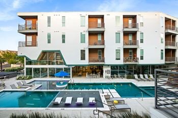 Multi-tiered resort waterfall-style swimming pool