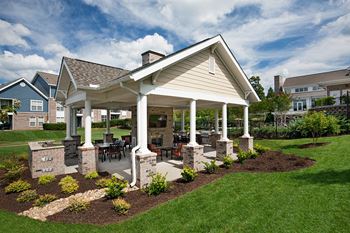 Summerhouse with fireplace, tv, and grills