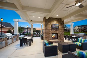 Summerhouse with fireplace, tv, and grills