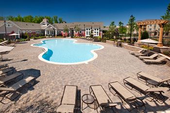 Two resort-style pools and sundeck with wi-fi