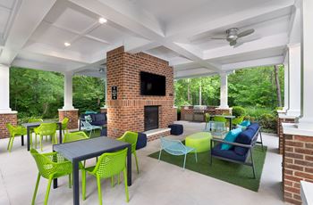 Summerhouse with tv, fireplace, and grills