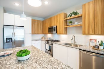 Two cabinetry finish options: dual tone white and maple euro-style cabinetry or espresso euro-style cabinetry