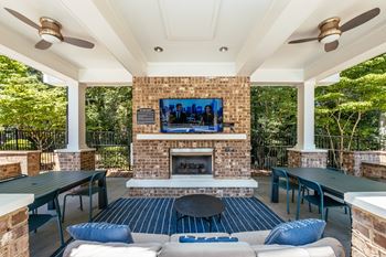 Summerhouse with fireplace, tv, and grills