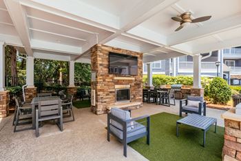Summerhouse with fireplace, tv, and grills