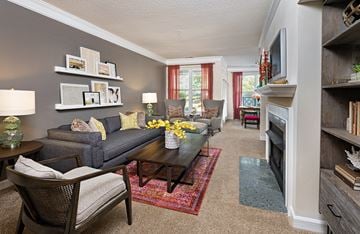 Cornelius apartment for rent - a living room with a couch and a table