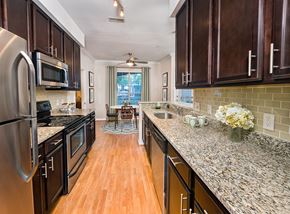 Charlotte apartment for rent - a kitchen with granite counter tops and stainless steel appliances