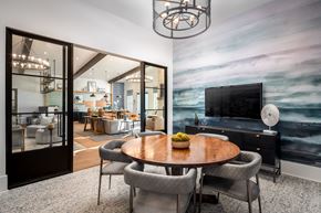 Gallatin apartment for rent - A modern dining room with a wooden table and grey chairs.