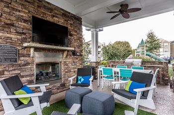 Summerhouse with fireplace, tv, and grills