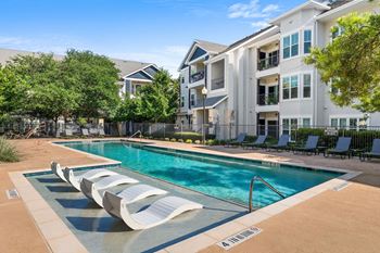 Two resort-style pool and sundeck with cabanas
