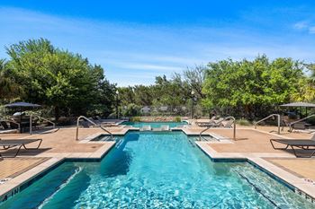 Two resort-style pool and sundeck with cabanas