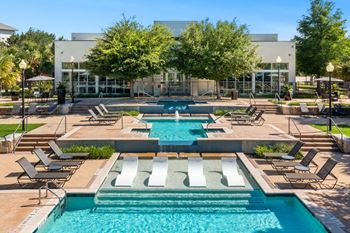 Two resort-style pool and sundeck with cabanas