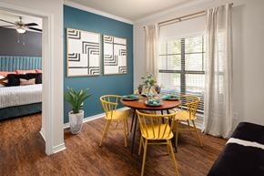 Austin apartment for rent - A dining room with a table set for four.