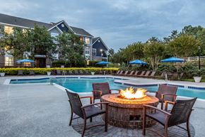 Raleigh apartment for rent - our apartments offer a swimming pool with a fire pit