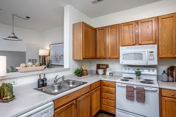 Maple cabinetry with brushed nickel hardware*
