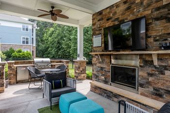 Summerhouse with fireplace, tv, and grills