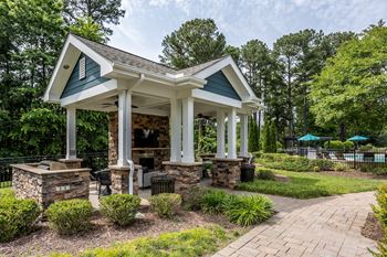 Summerhouse with fireplace, tv, and grills