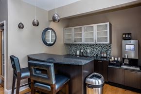 Morrisville apartment for rent - a kitchen with a counter top and two chairs