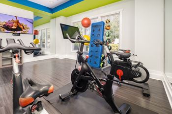 Peloton bike with interactive courses