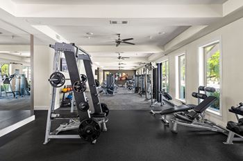 24-Hour cardio/strength training fitness center with yoga/aerobics area and gym studios