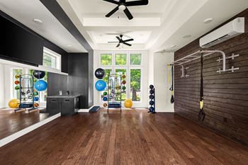 24-Hour cardio/strength training fitness center with yoga/aerobics area and gym studios