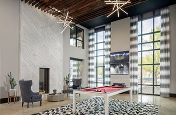 24-Hour game room with billiards, shuffleboard and vintage arcade games