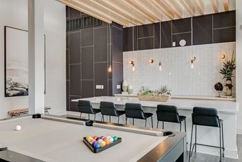Resident lounge with billiards and demonstration kitchen