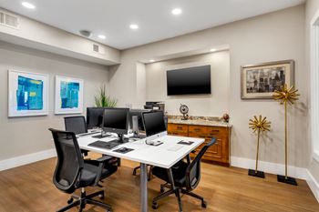 Business center with mac, pcs and wireless printing