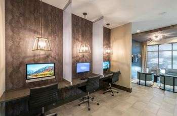 Business center with mac/pcs and wireless printing