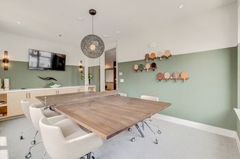 Meeting room with ping pong conference table