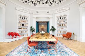 Nashville apartment for rent - a dining room with a table and chairs and bookshelves