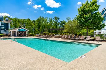 Two resort-style pools and sundeck with wi-fi