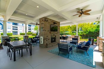 Summerhouse with fireplace, tv, and grills