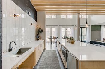 Resident lounge with billiards and demonstration kitchen