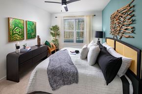 Atlanta apartment for rent - a bedroom with a large bed and a large window